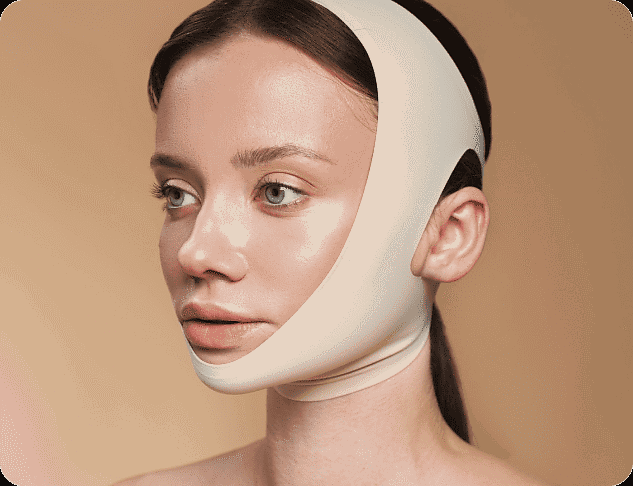 A woman with fair skin, wearing a white facial lifting bandage often used post-jaw surgery, is featured against a beige background for Holt Orthodontics in Twinsburg, OH.