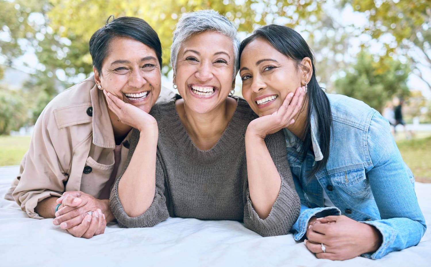 A woman after dental treatment with adult braces smiles, representing top-rated Holt Orthodontics in Twinsburg, OH.
